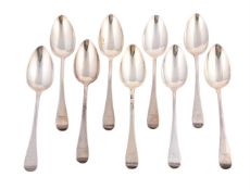 A SET OF NINE GEORGE III OLD ENGLISH PATTERN TABLE SPOONS