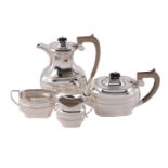 A SILVER OBLONG BALUSTER FOUR PIECE TEA SET