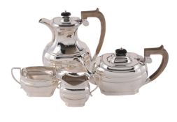 A SILVER OBLONG BALUSTER FOUR PIECE TEA SET