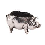 A SILVER PEN WIPE IN THE FORM OF A PIG