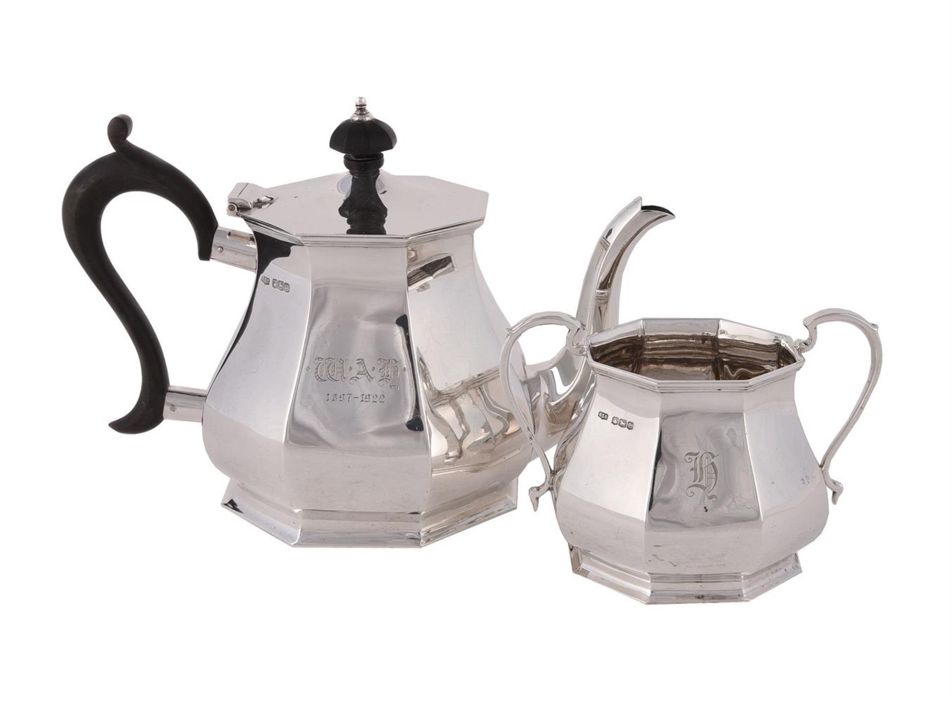 A SILVER OCTAGONAL BALUSTER TEA POT AND SUGAR BOWL