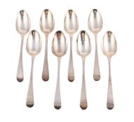 A SET OF SEVEN GEORGE III OLD ENGLISH PATTERN TABLE SPOONS