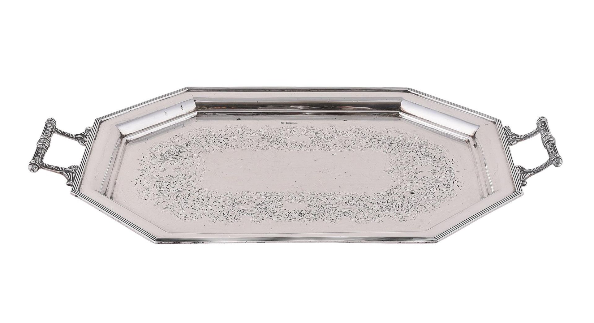 A SILVER OCTAGONAL TWIN HANDLED TRAY