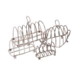 FOUR SILVER TOAST RACKS