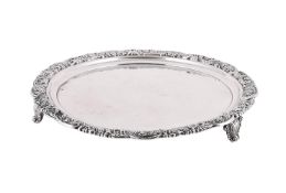 A GEORGE III SILVER SHAPED CIRCULAR SALVER