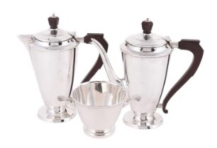 A SILVER THREE PIECE TAPERING TEA SET