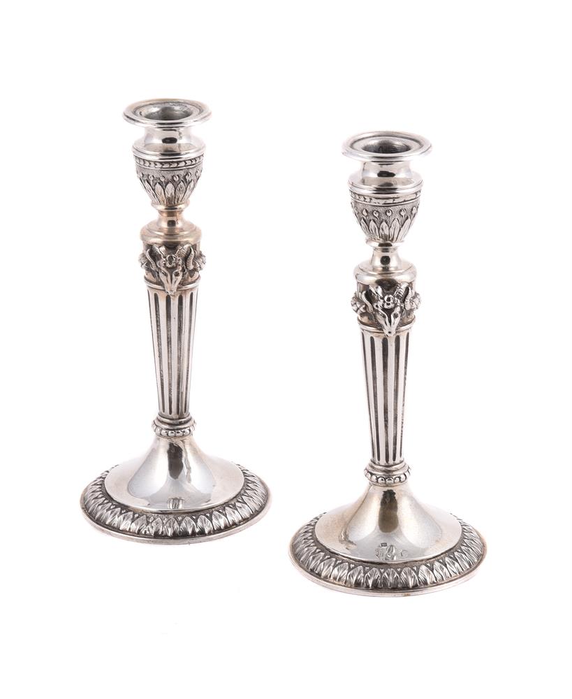 A PAIR OF SMALL CONTINENTAL SILVER CANDLESTICKS