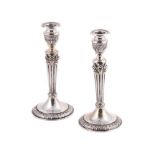 A PAIR OF SMALL CONTINENTAL SILVER CANDLESTICKS