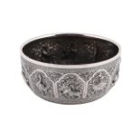 AN INDIAN SILVER COLOURED BOWL