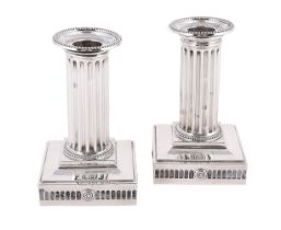 A PAIR OF VICTORIAN SILVER SHORT COLUMNAR CANDLESTICKS