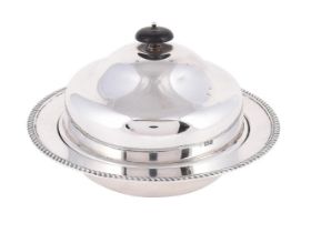 A SILVER MUFFIN DISH AND COVER