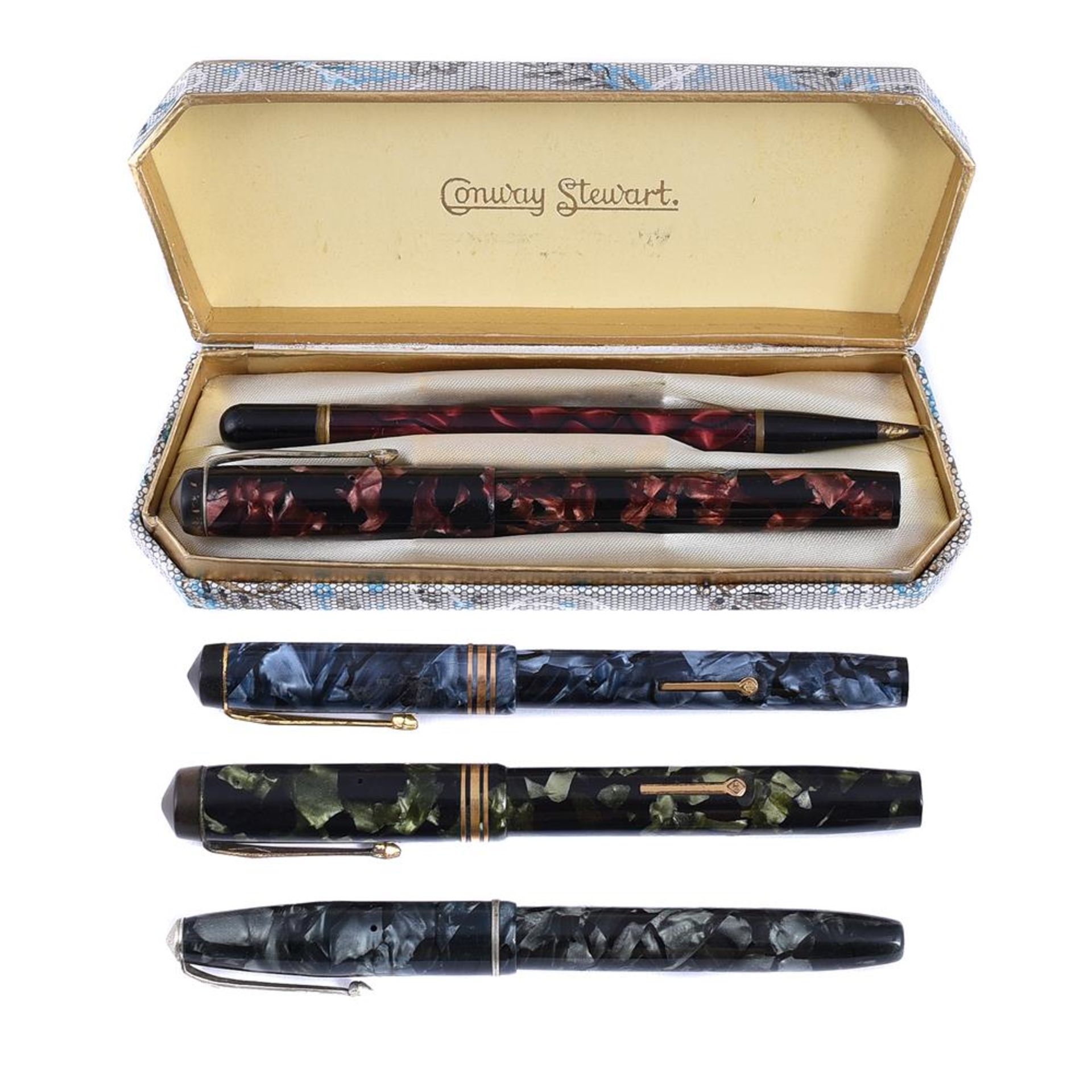 CONWAY STEWART, FOUR FOUNTAIN PENS AND A PROPELLING PENCIL