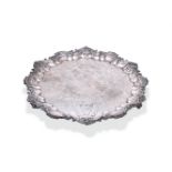 A VICTORIAN SILVER SHAPED CIRCULAR SALVER LONDON 1899