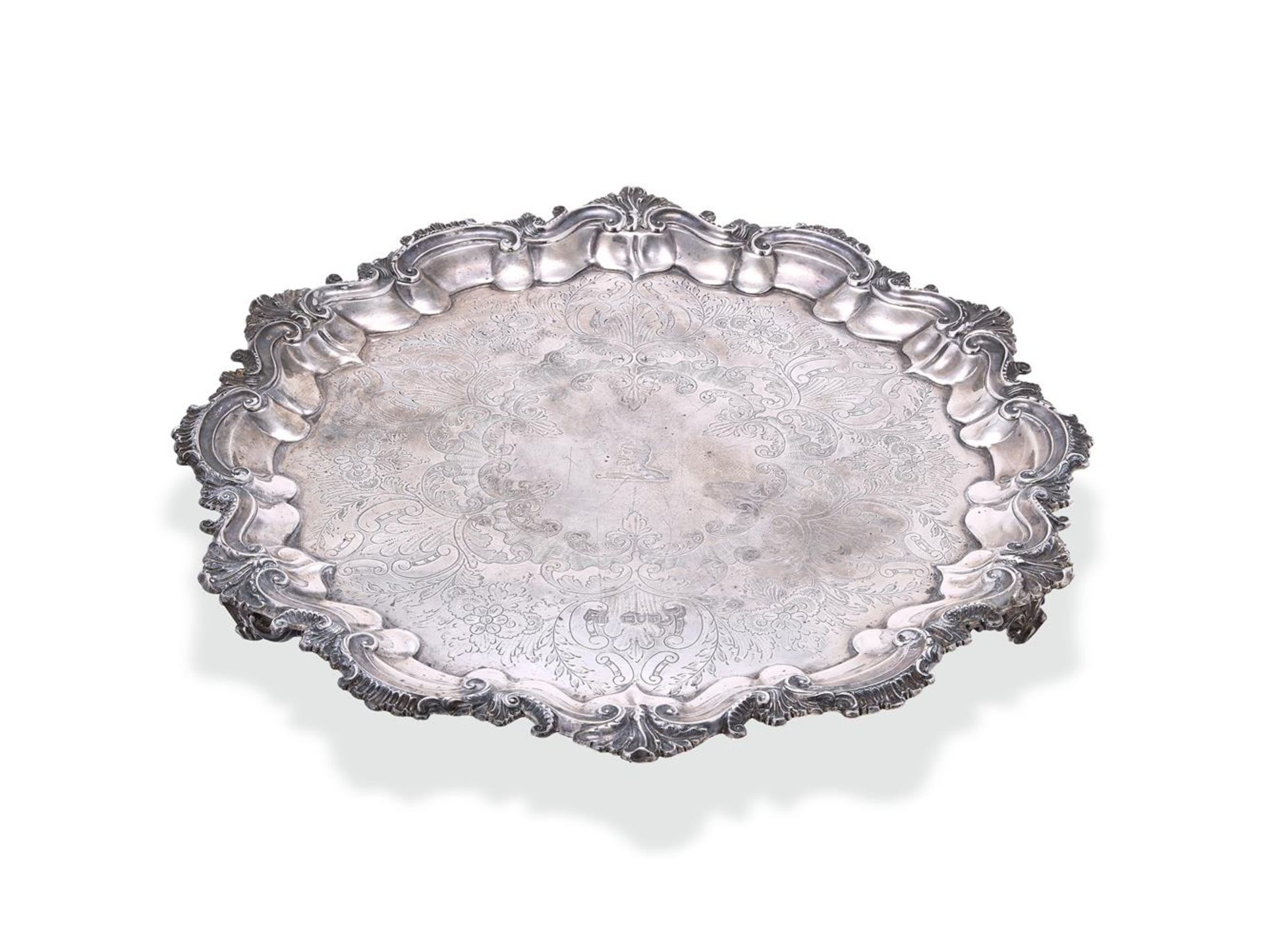 A VICTORIAN SILVER SHAPED CIRCULAR SALVER LONDON 1899