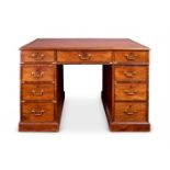 A GEORGE III MAHOGANY SMALL PARTNER'S DESK