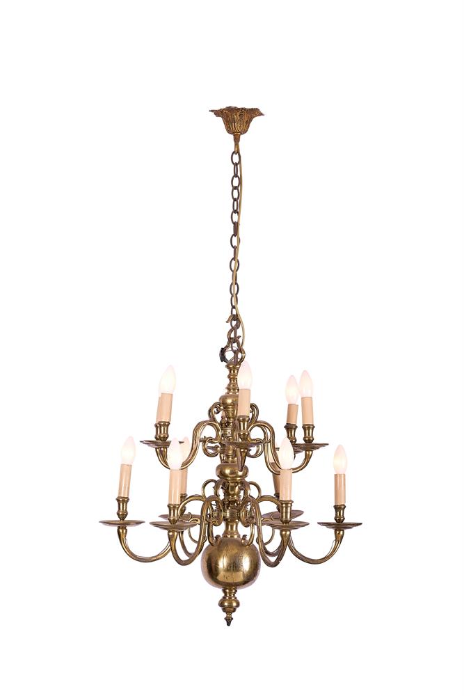 A DUTCH BRASS TWELVE LIGHT CHANDELIER DATED 1770