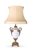 A GILT METAL MOUNTED MILK GLASS TABLE LAMP LATE 19TH CENTURY