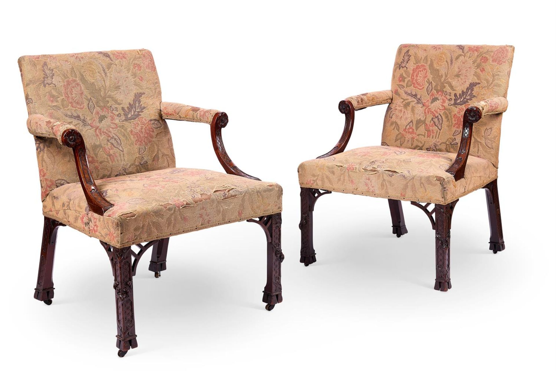 A PAIR OF GEORGE III STYLE MAHOGANY LIBRARY ARMCHAIRS