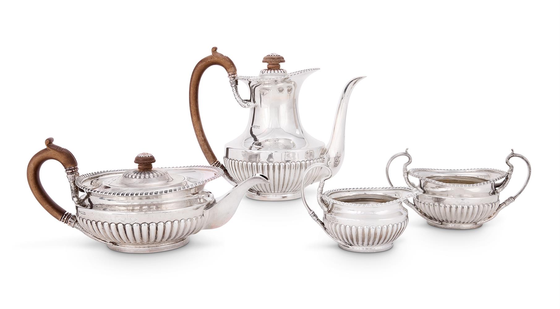 A SILVER FOUR PIECE HALF LOBED CIRCULAR TEA AND COFFEE SET MAPPIN & WEBB