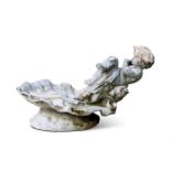 A SMALL LEAD FIGURE OF A CHILD ON A SHELL, 20TH CENTURY