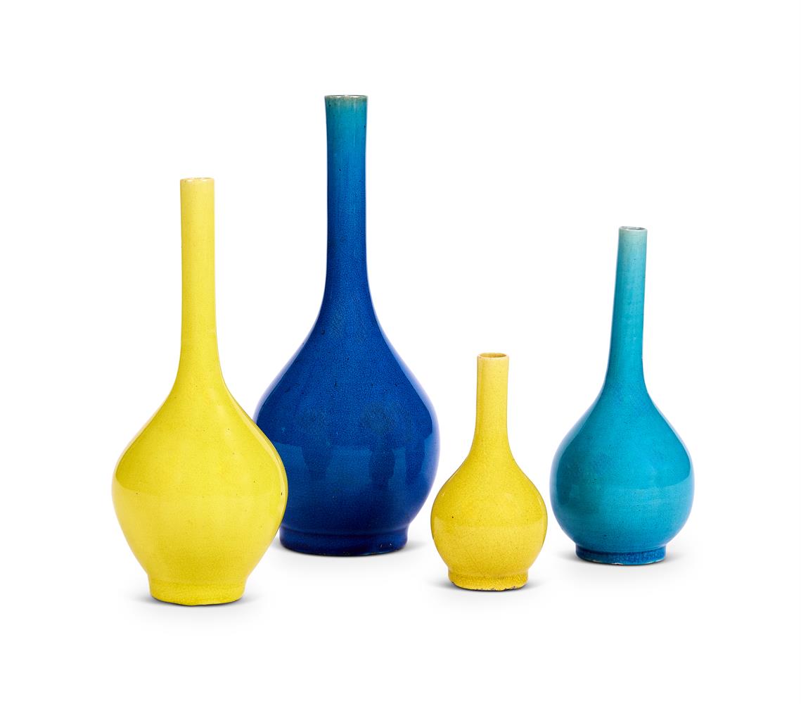 A SET OF FOUR OVOID GLAZED BUD VASES FRENCH CIRCA 1900