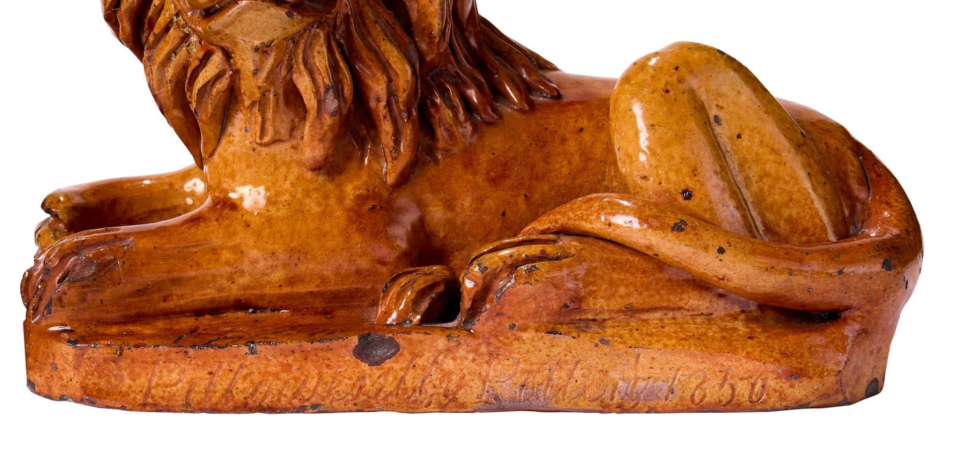 A MATCHED PAIR OF PILL POTTERY (NEWPORT MONMOUTHSHIRE) TREACLE-GLAZED RED POTTERY RECUMBENT LIONS - Image 2 of 3