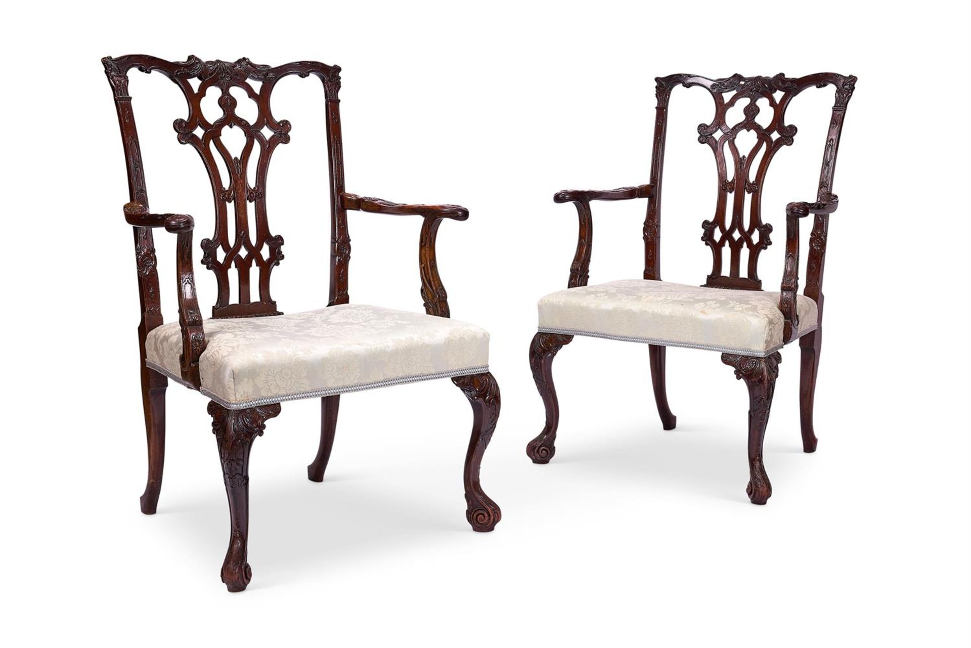 A PAIR OF LATE VICTORIAN MAHOGANY ARMCHAIRS