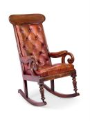 A VICTORIAN MAHOGANY ROCKING-CHAIR