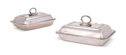 A PAIR OF GEORGE V SILVER OBLONG ENTREE DISHES AND COVERS