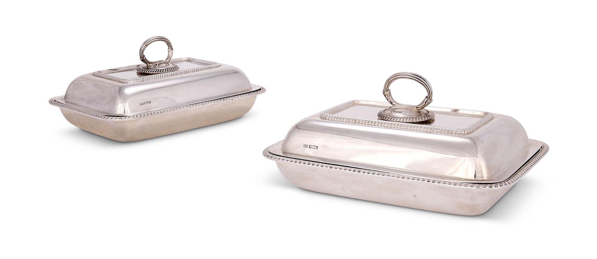 A PAIR OF GEORGE V SILVER OBLONG ENTREE DISHES AND COVERS