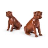 A PAIR OF EARLY VICTORIAN BROWN PAINTED TERRACOTTA MODELS OF SEATED PUGS DATED 1846