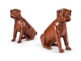 A PAIR OF EARLY VICTORIAN BROWN PAINTED TERRACOTTA MODELS OF SEATED PUGS DATED 1846