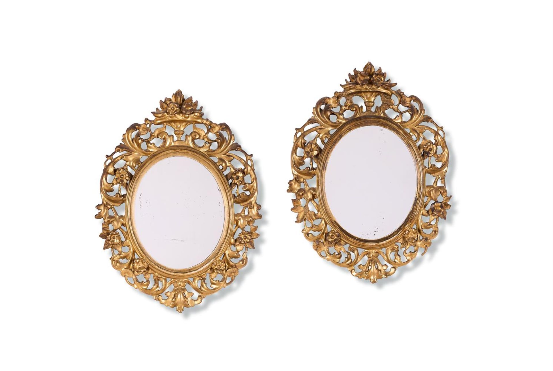 A PAIR OF EARLY VICTORIAN OVAL MIRRORS MID-19TH CENTURY