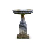 A LARGE RECONSTITUTED STONE BIRD BATH, EARLY 20TH CENTURY