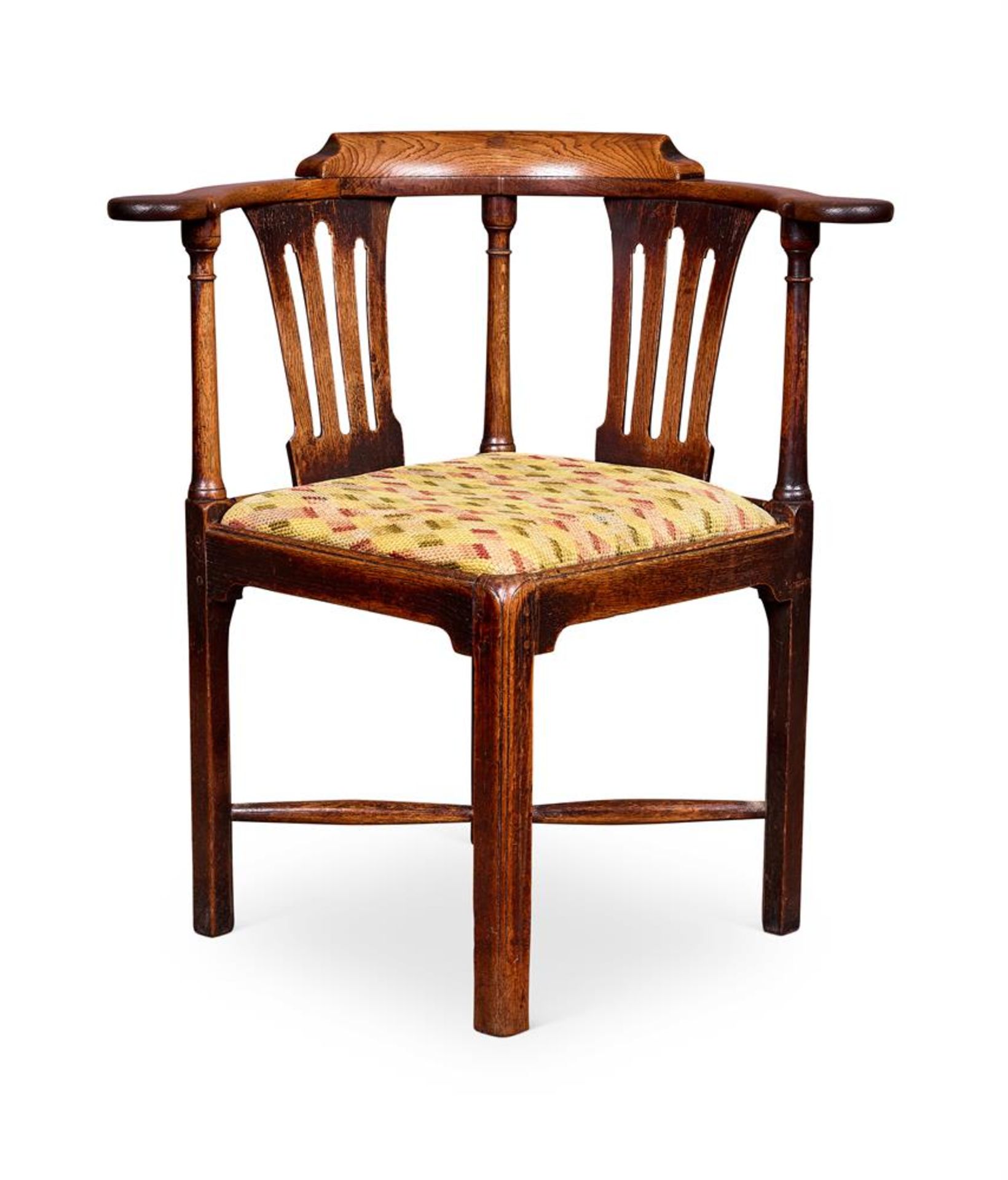 A GEORGE III MAHOGANY CORNER ARMCHAIR CIRCA 1770