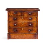 AN EARLY VICTORIAN WALNUT MINIATURE CHEST OR APPRENTICE PIECE CIRCA 1840