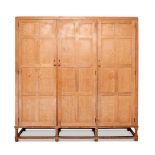 A HEALS LIMED OAK THREE-DOOR WARDROBE CIRCA 1930