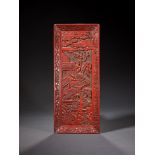 A CHINESE CARVED CINNABAR LACQUER RECTANGULAR SCROLL TRAY, QING DYNASTY