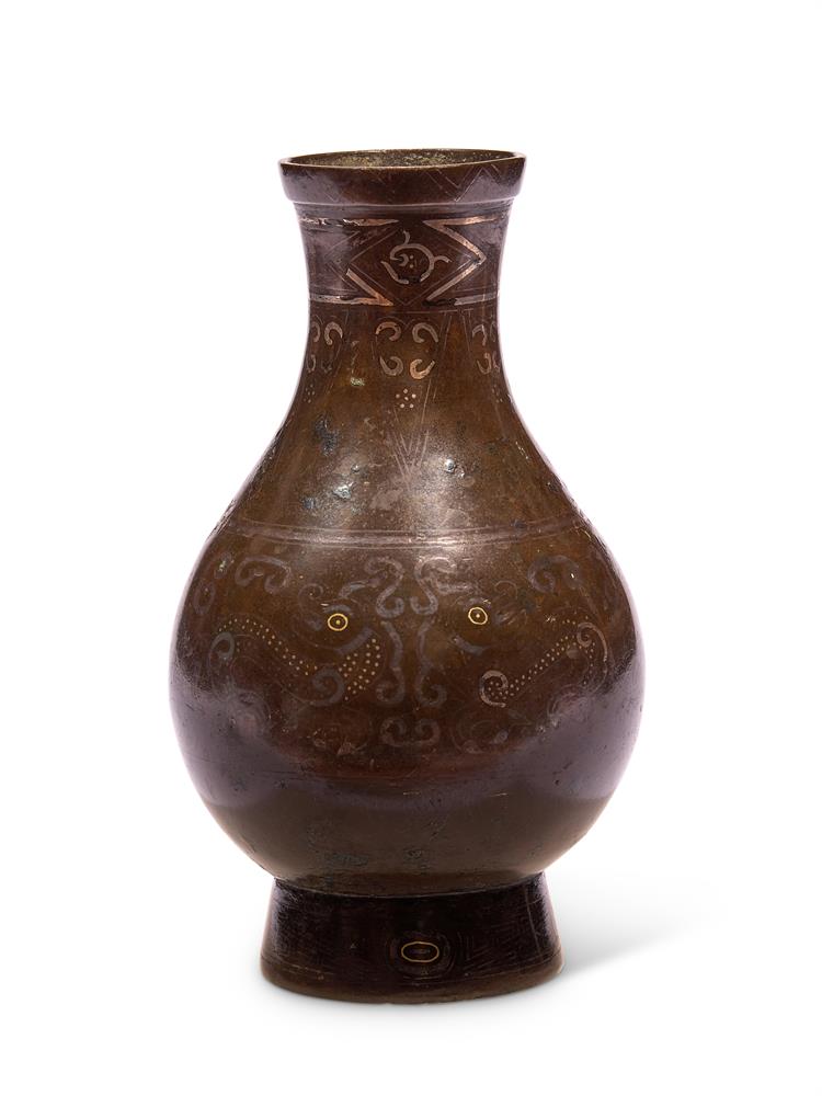 A CHINESE BRONZE GILT AND SILVER INLAID VASE, QING DYNASTY