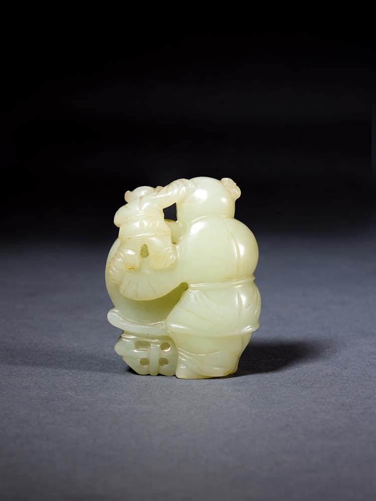 A CHINESE PALE CELADON JADE CARVING OF A 'BOY AND DRUM', QING DYNASTY - Image 2 of 3