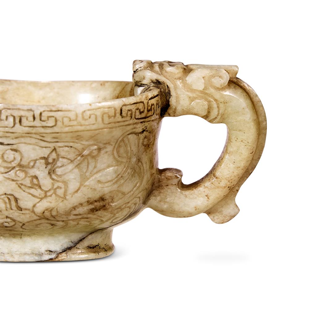 A CHINESE CELADON AND BLACK JADE LIBATION POURING VESSEL - Image 2 of 4