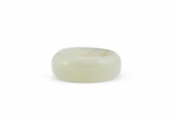 A CHINESE PALE CELADON JADE RING, QING DYNASTY