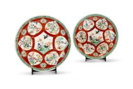 A LARGE PAIR OF CHINESE FAMILLE VERTE CORAL-GROUND DISHES, QING DYNASTY