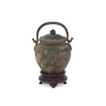 A CHINESE SMALL BRONZE JAR AND COVER, HAN DYNASTY OR LATER