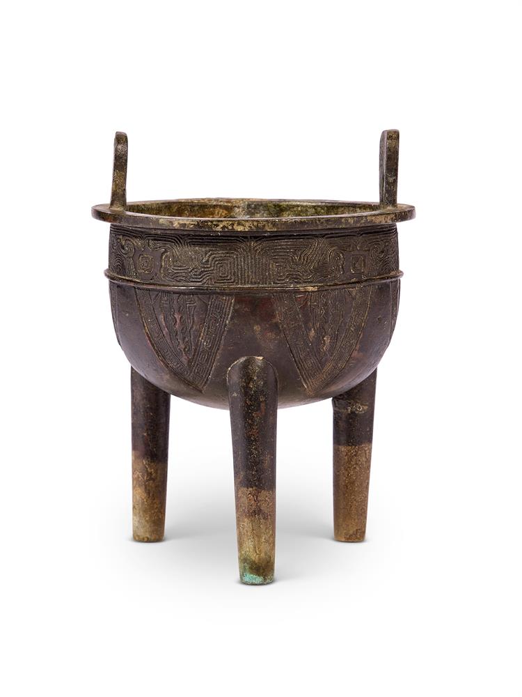 A CHINESE BRONZE 'ARCHAISTIC' TRIPOD CENSER, 17TH OR 18TH CENTURY
