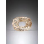 A CHINESE CALICIFIED 'CHICKEN BONE' JADE PLAQUE, WARRING STATES-HAN PERIOD (475 BC-220 AD)