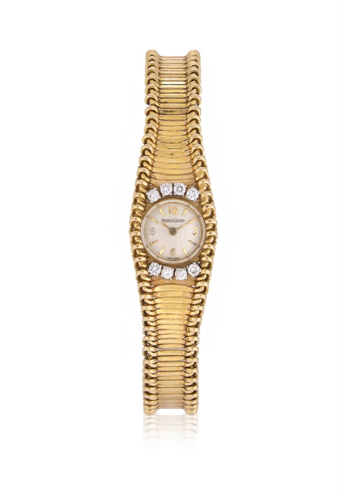 JAEGER LECOULTRE, A LADY'S 18 CARAT GOLD AND DIAMOND BRACELET WATCH