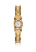 JAEGER LECOULTRE, A LADY'S 18 CARAT GOLD AND DIAMOND BRACELET WATCH