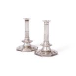 A PAIR OF WILLIAM AND MARY SILVER CANDLESTICKS