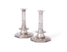 A PAIR OF WILLIAM AND MARY SILVER CANDLESTICKS